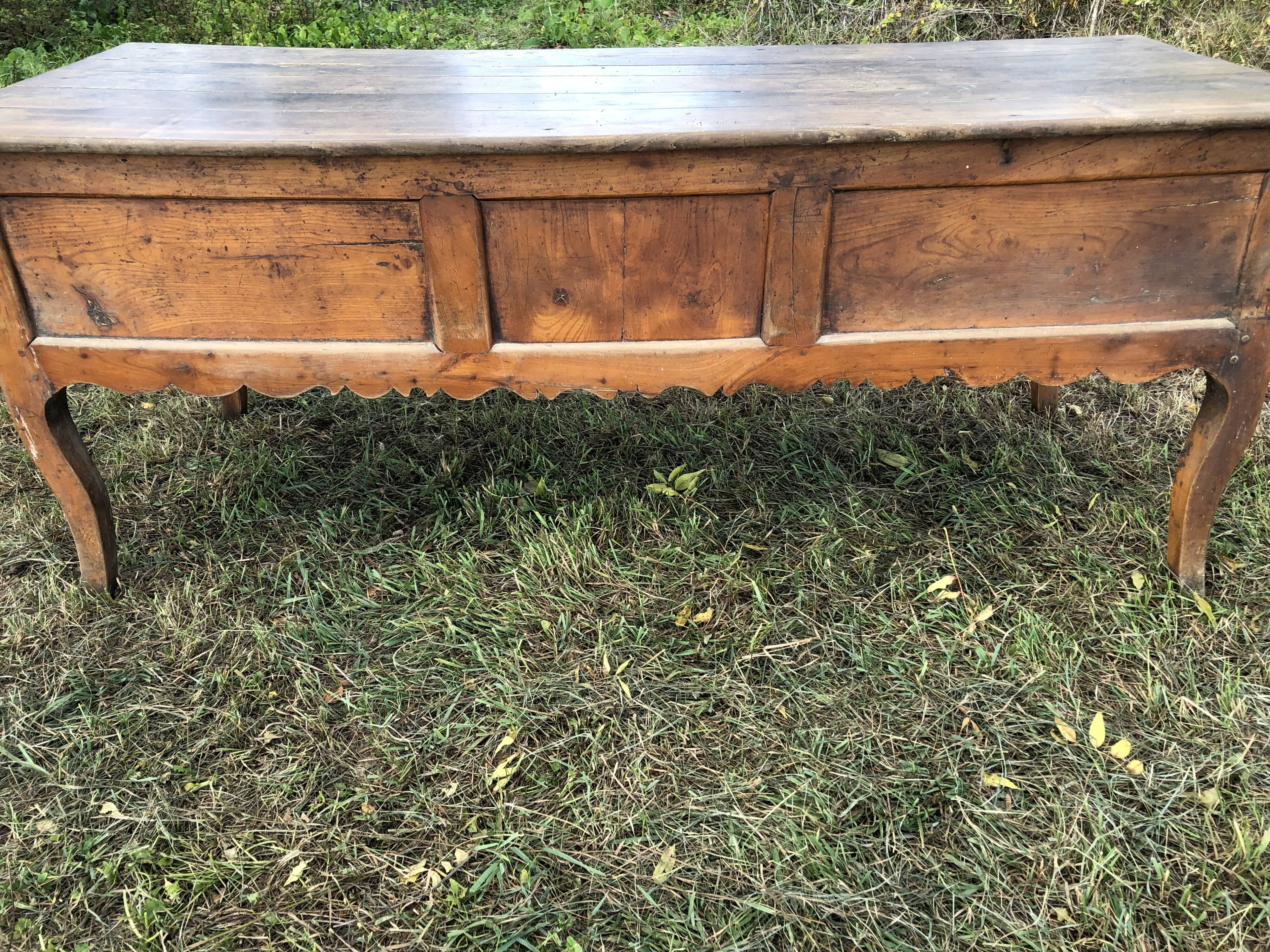 Antique Louis XV paneled table with 3 front drawers in solid cherry wood