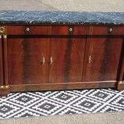 Flamed mahogany enfilade with sea green marble in Empire style.