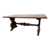 Table a manger de style Renaissance en bois massif sculpté XX siècle