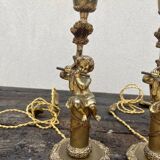 Pair of bronze cherub lamp feet