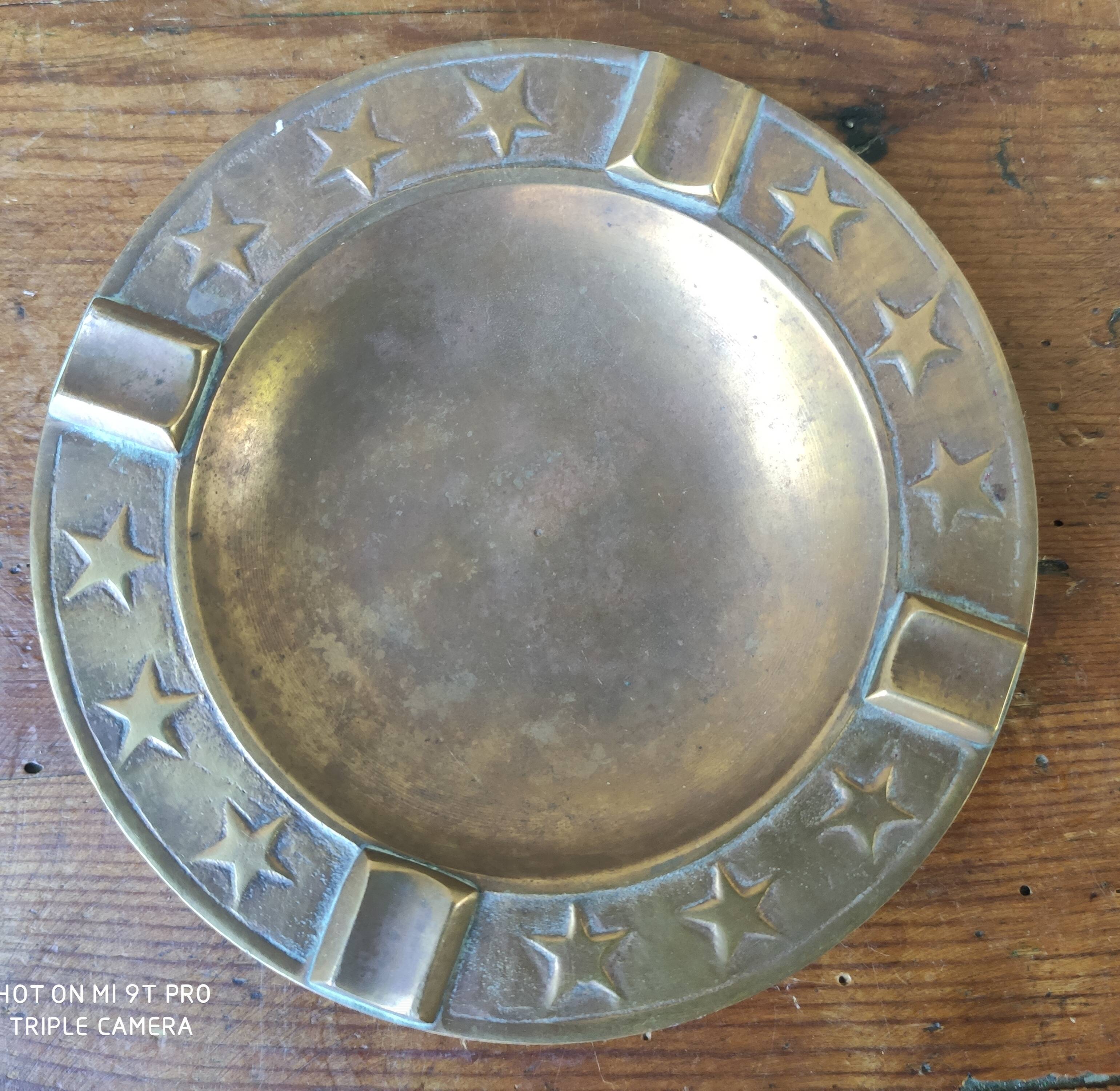 Brass ashtray with stars