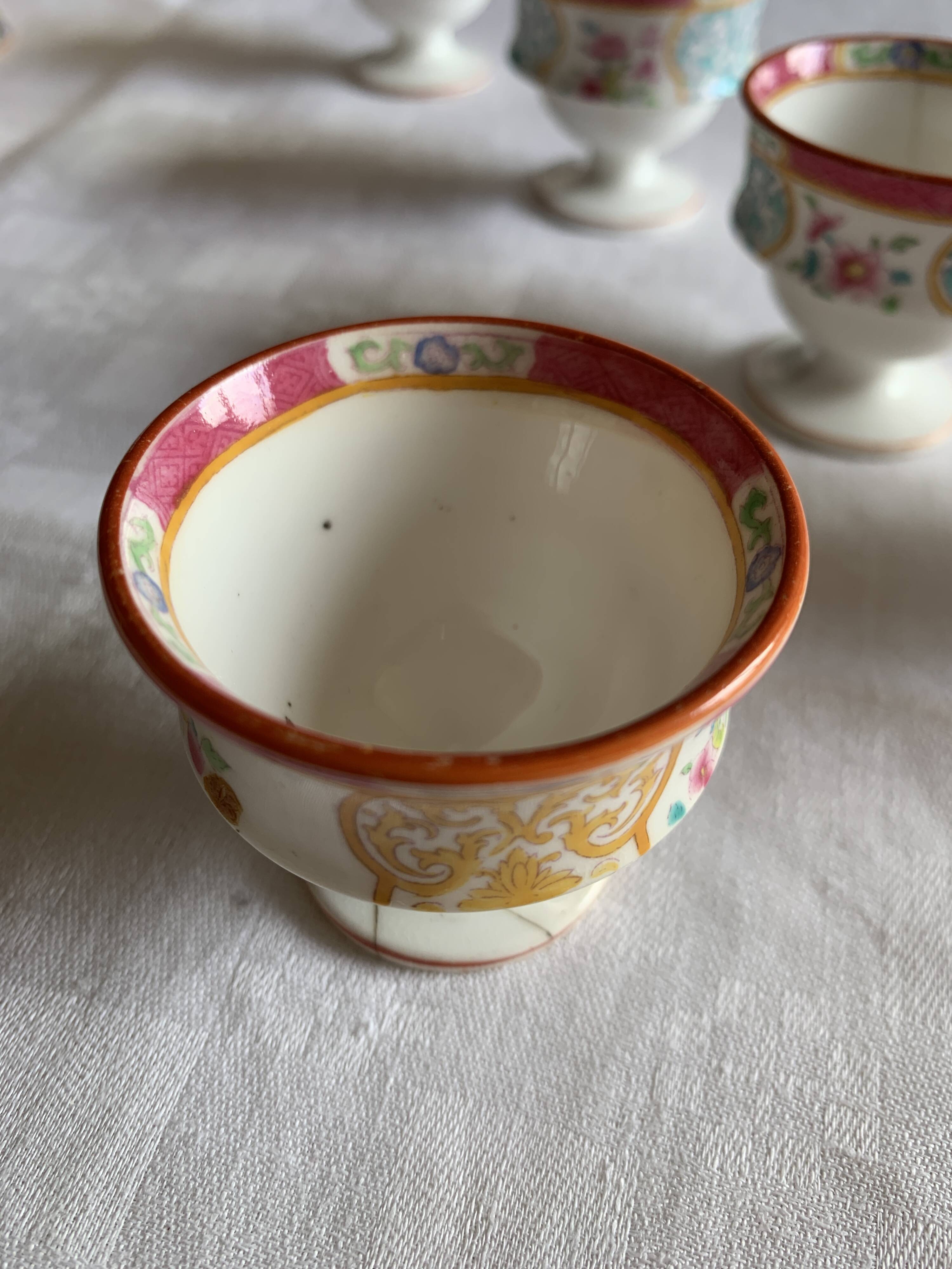 Minton egg cup holder and its 6 egg cups