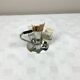 Vintage salt and pepper shakers and their chrome metal support