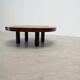 Round coffee table by Roger Capron