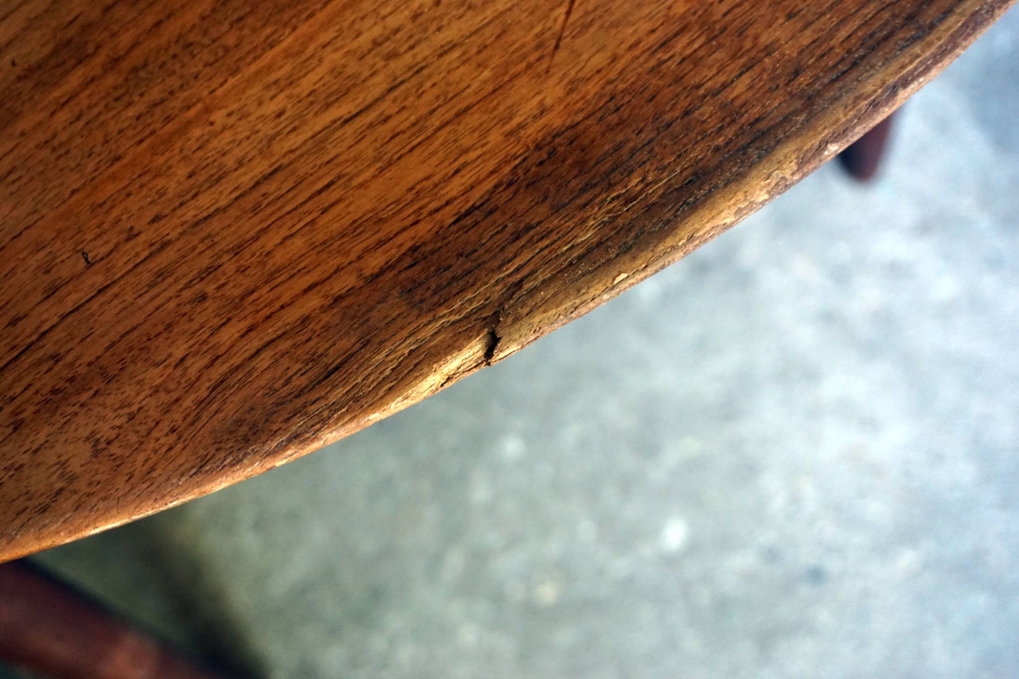 Elegant round teak table with extension.