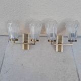 Pair of vintage wall lights from the 50s and 60s in brass glass