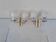 Pair of vintage wall lights from the 50s and 60s in brass glass