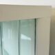 White vintage slatted display case on gold legs