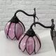 Pair of iron and glass wall lights
