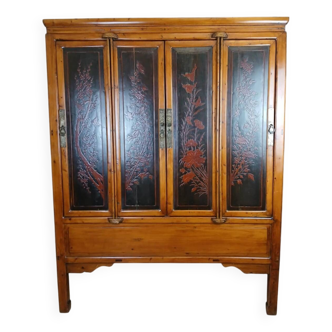 China, early 20th century: large lacquer cabinet with floral decorations