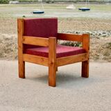 Pair of pine fireside chairs, France, 1960s, "raspberry" cushions