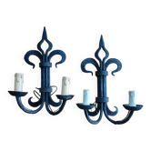 Pair of wrought iron wall lights, French castle lily design.