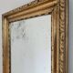 Antique French giltwood wall mirror in gold