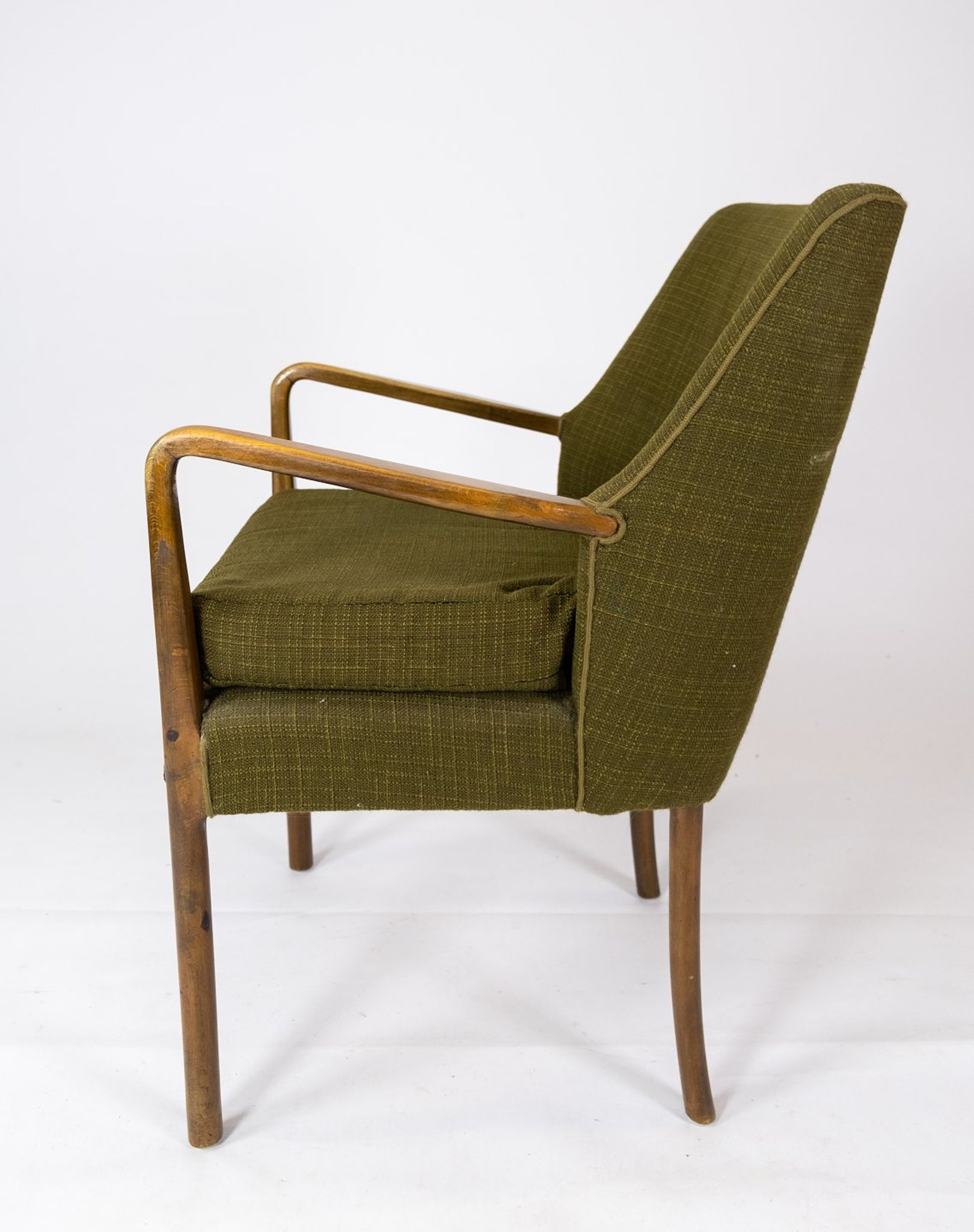 Armchair in birch and orginal dark green fabric of danish design from the 1950