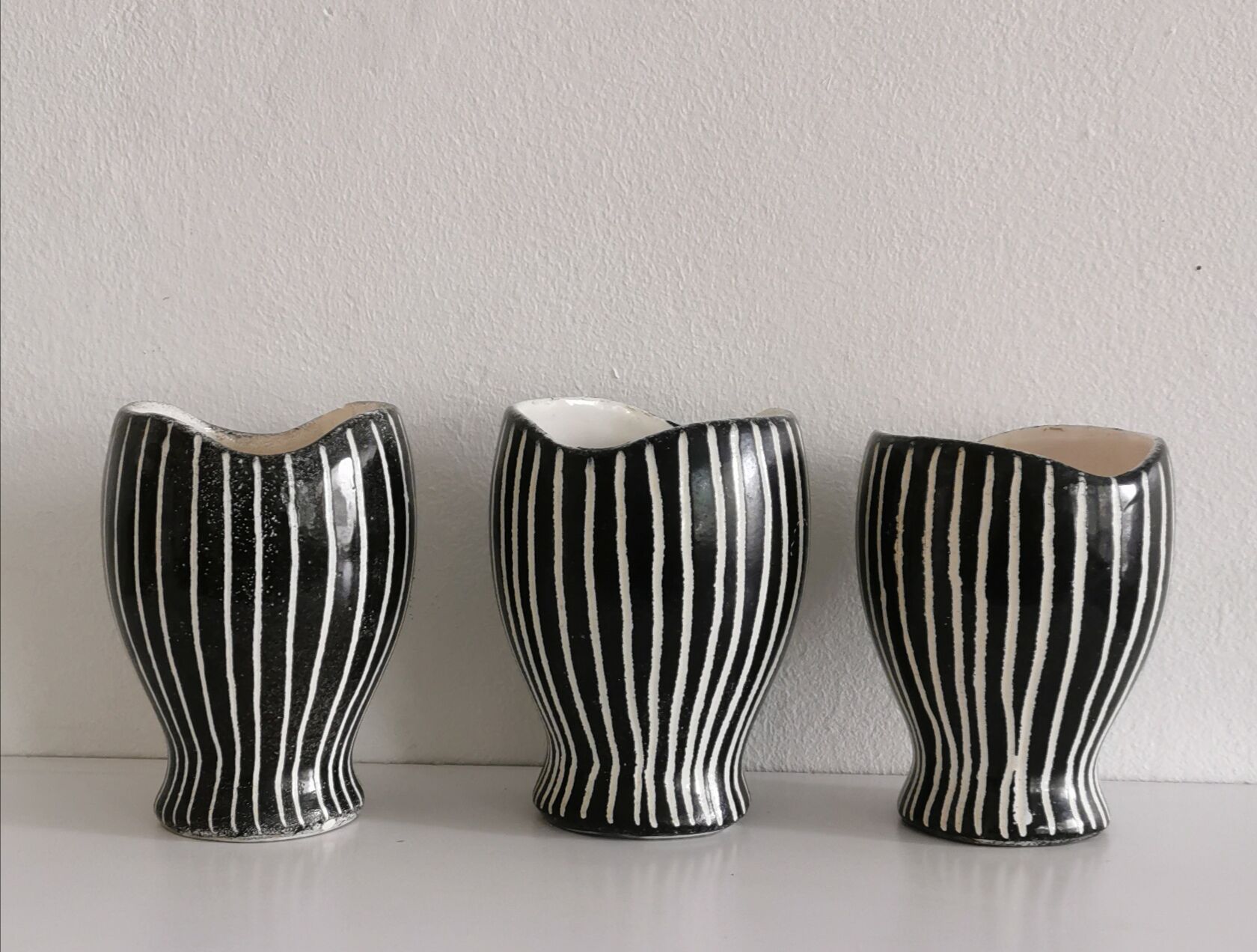 Series of 3 black and white ceramic pots 1950