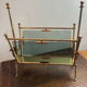 Brass magazine rack and blue-tinted glasses, 1950s.