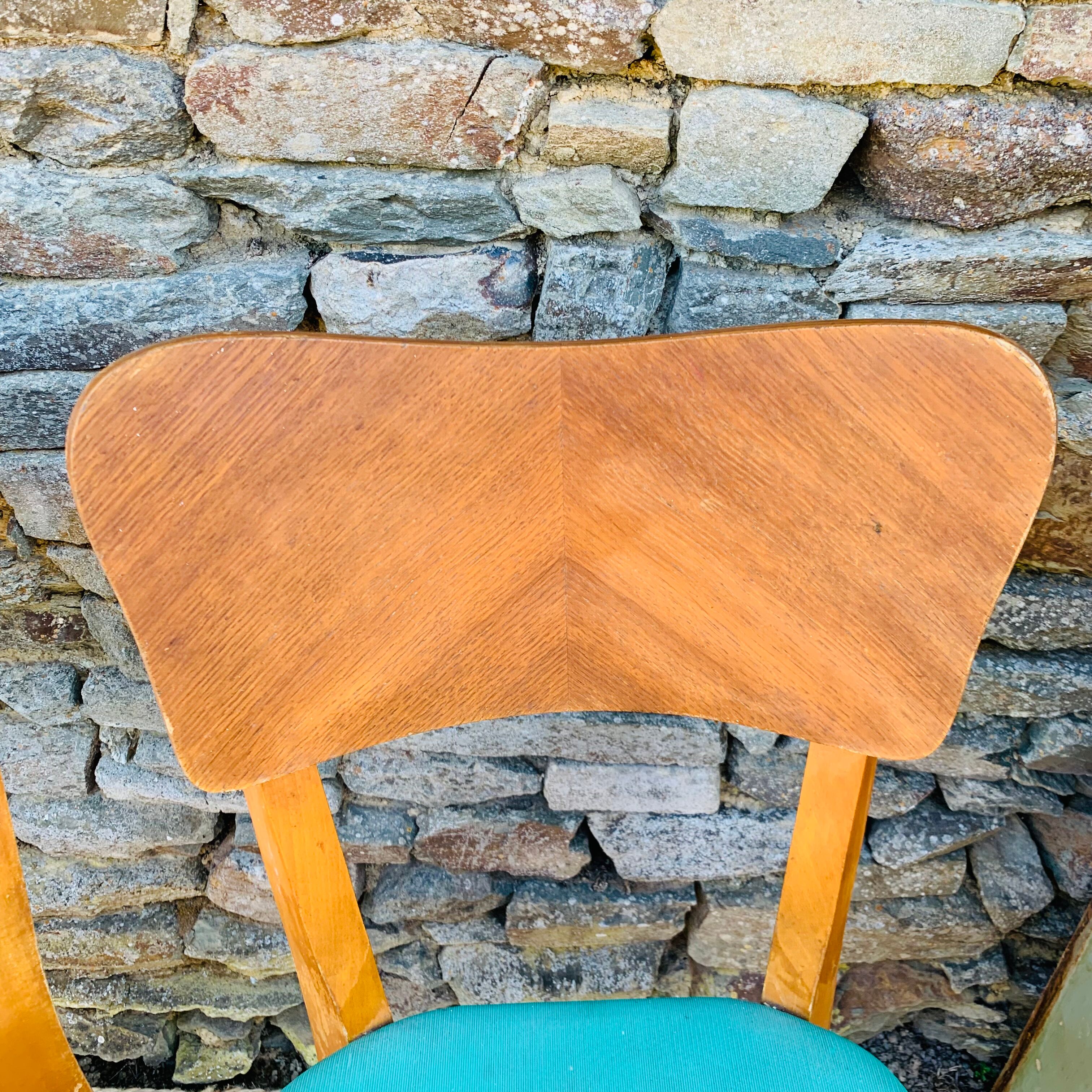 Set of 4 vinyl and wood chairs