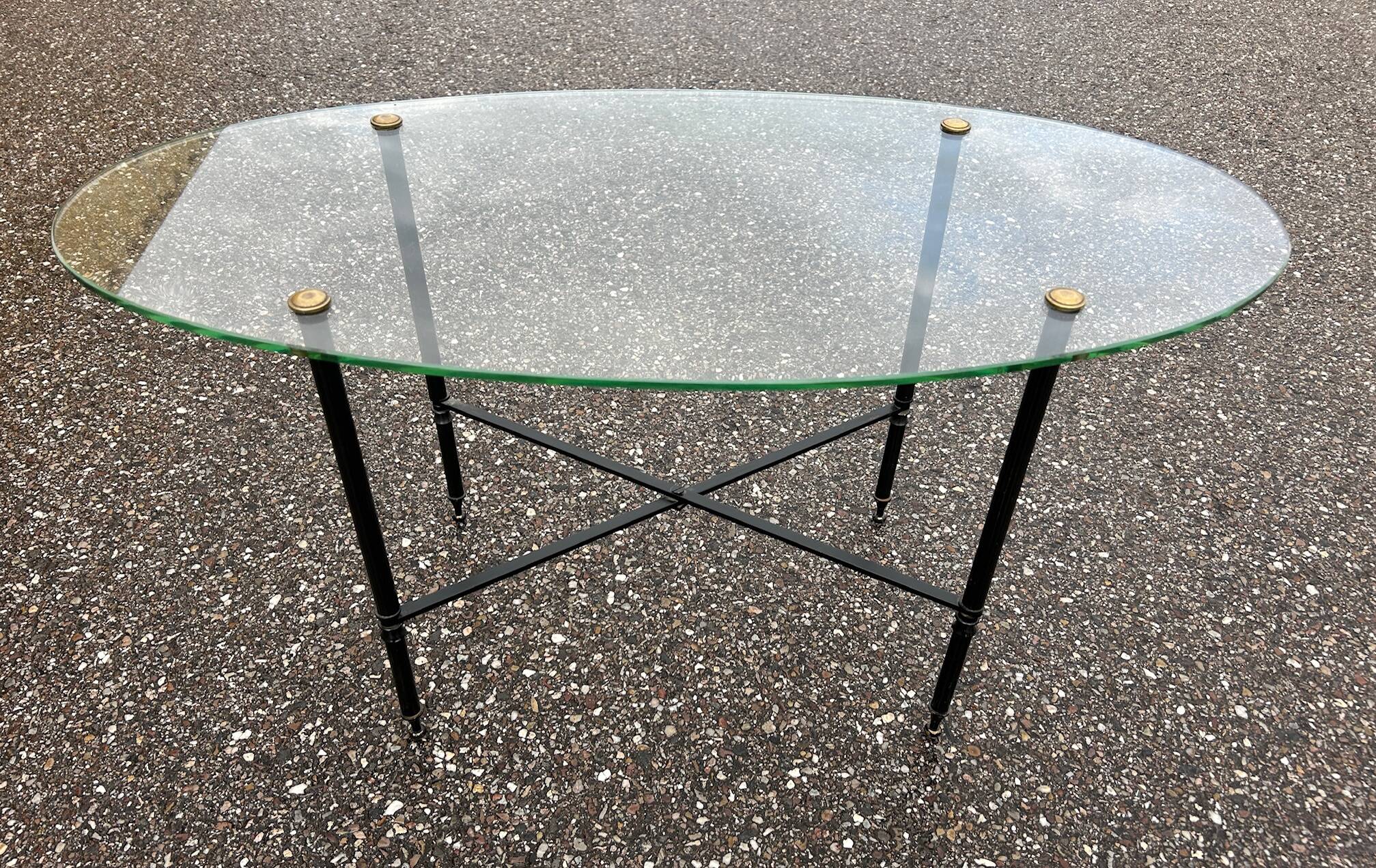 Oval glass and brass coffee table 1950