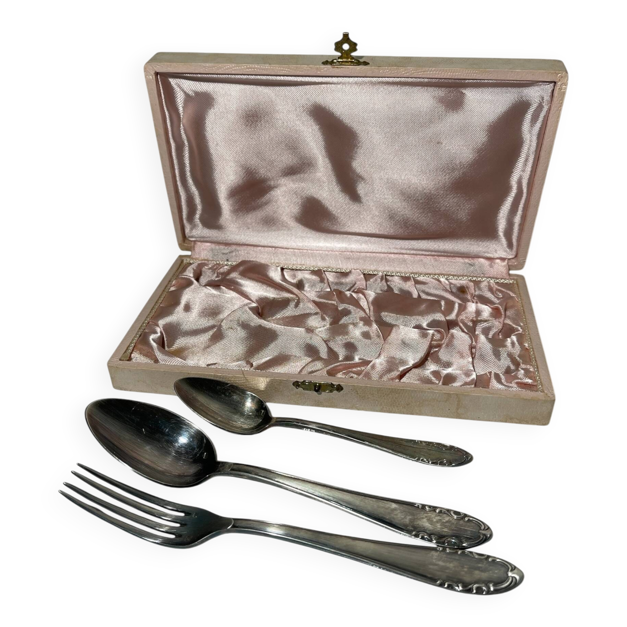 Set of antique silver-plated cutlery for children.