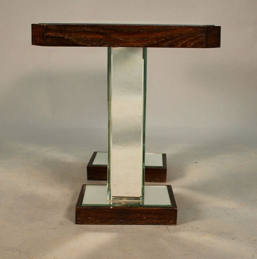 Mirror table from 1940 with two legs.
