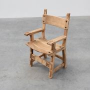 Brutalist armchair with carved rosettes and nailed wooden seat, Spain, 20th