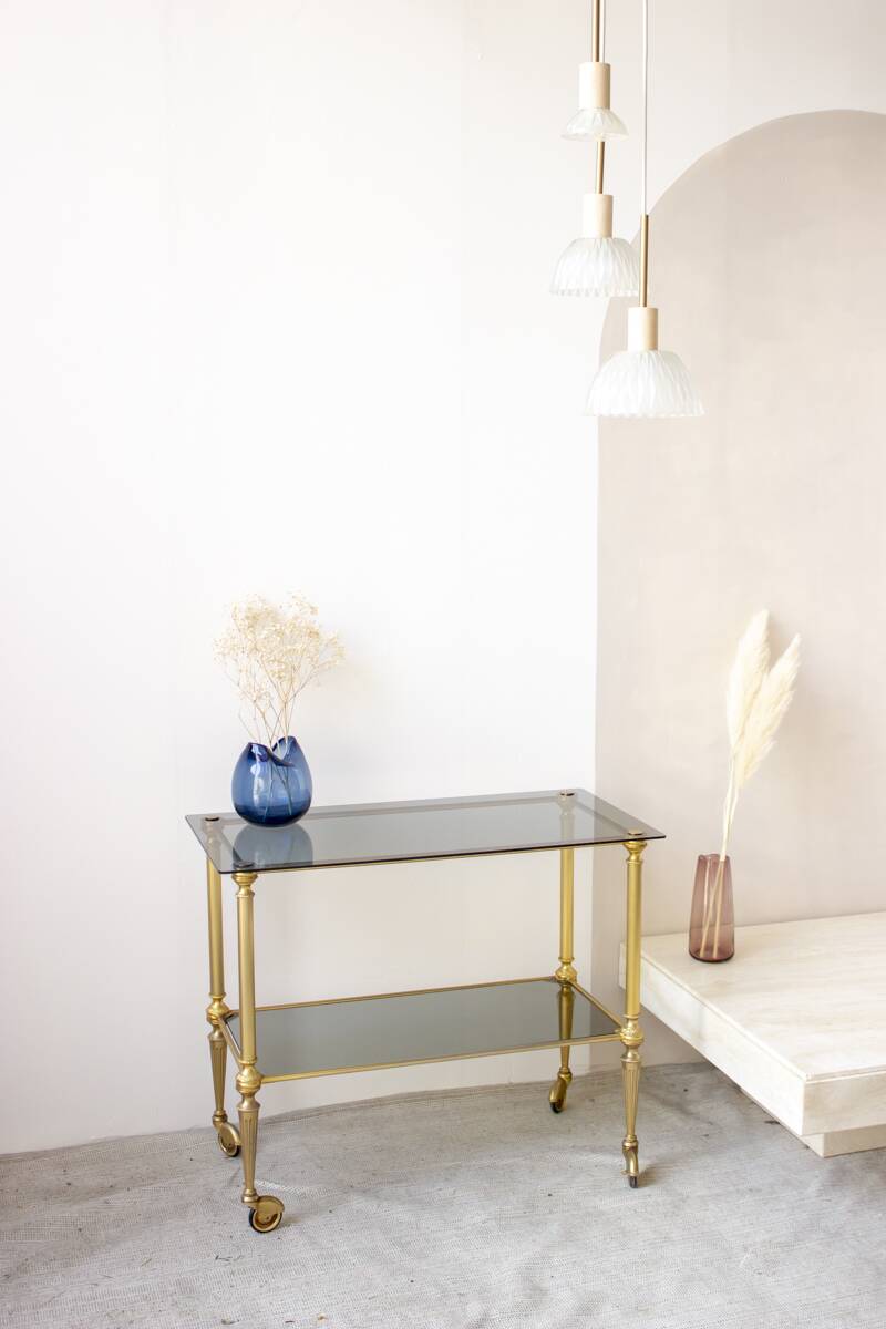 Gold metal and smoked glass server