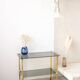 Gold metal and smoked glass server