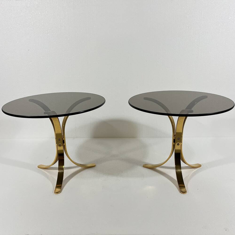 Brass and smoked glass side tables from the 1960s.