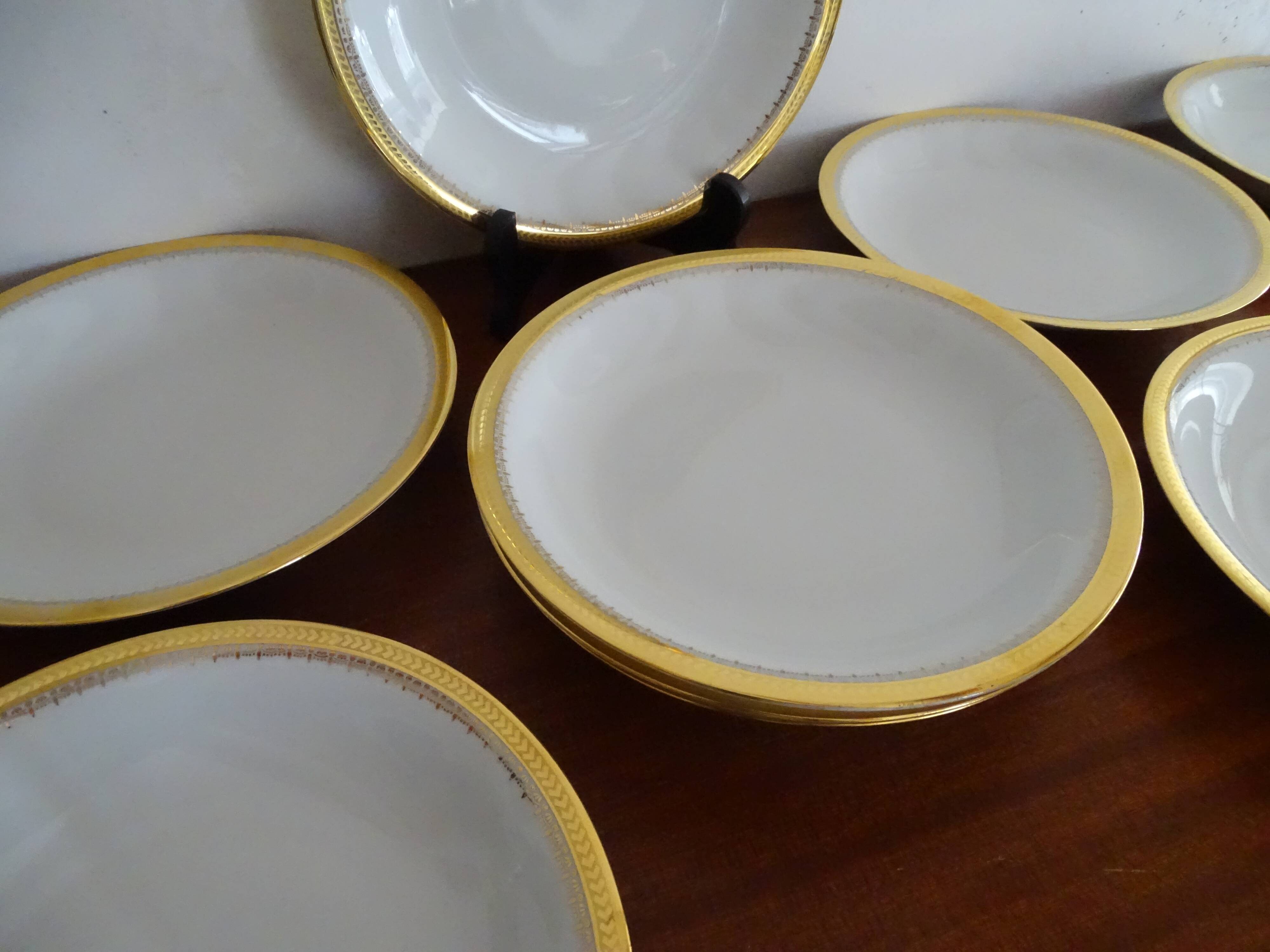12 hollow plates porcelain of Sologne Larchevèque white and golden signed