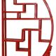 Red shelf with sculpted base