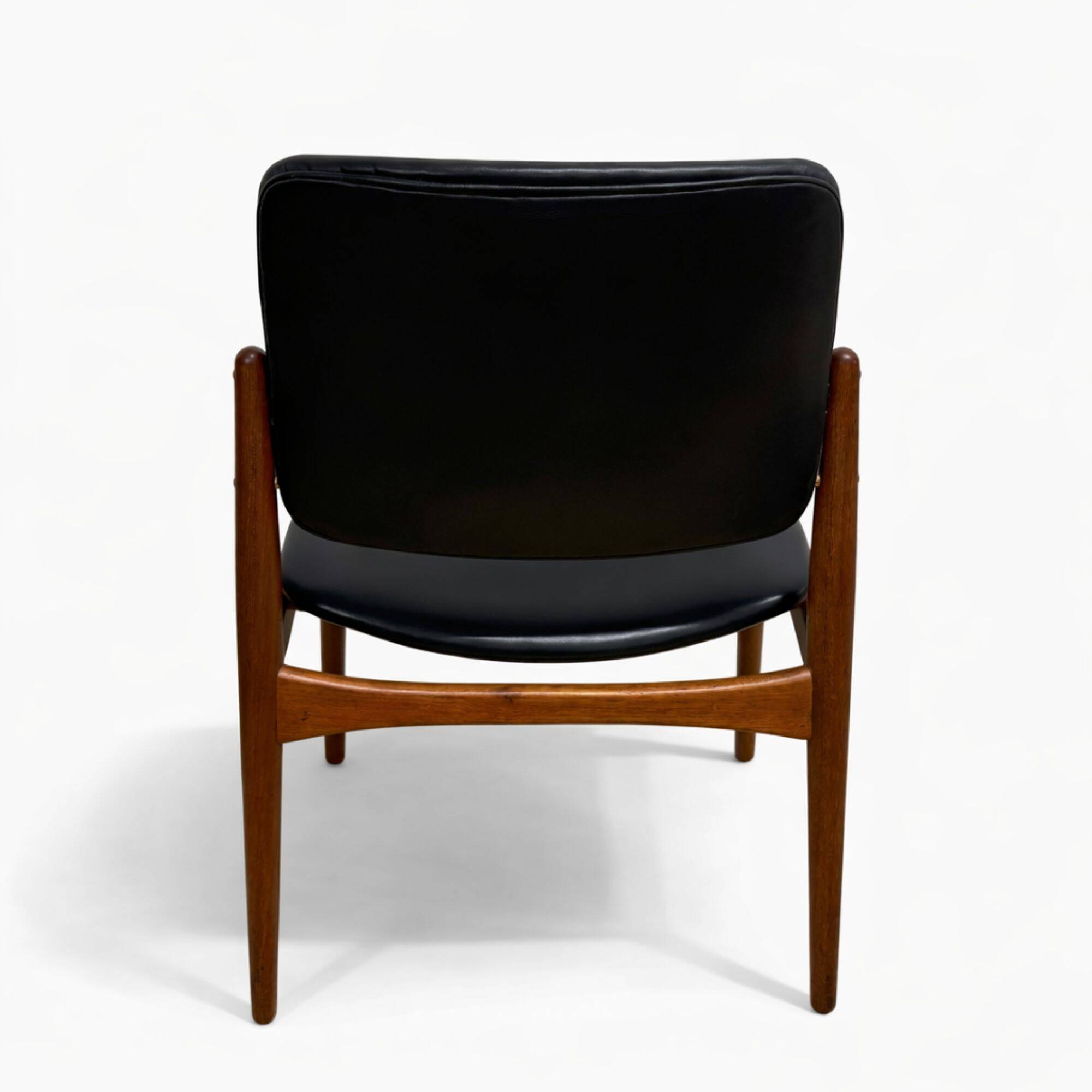 Captain chair pair by Erik Buch
