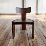 Retro brutalist chair in dark solid wood