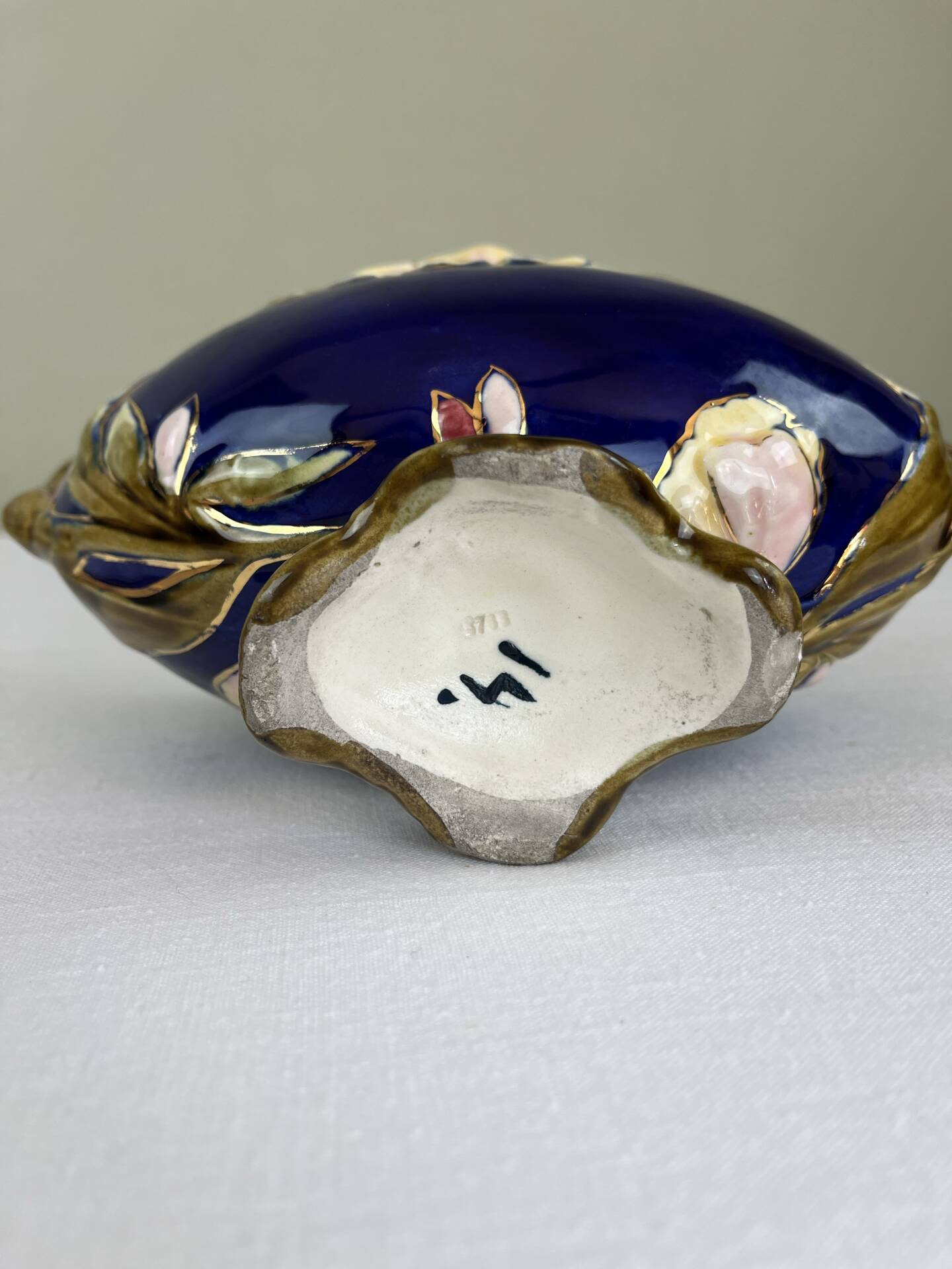 Art Nouveau navy blue barbotine bowl with raised floral decoration