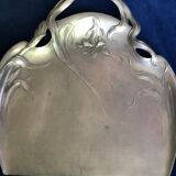 Old art nouveau crumbs picks up