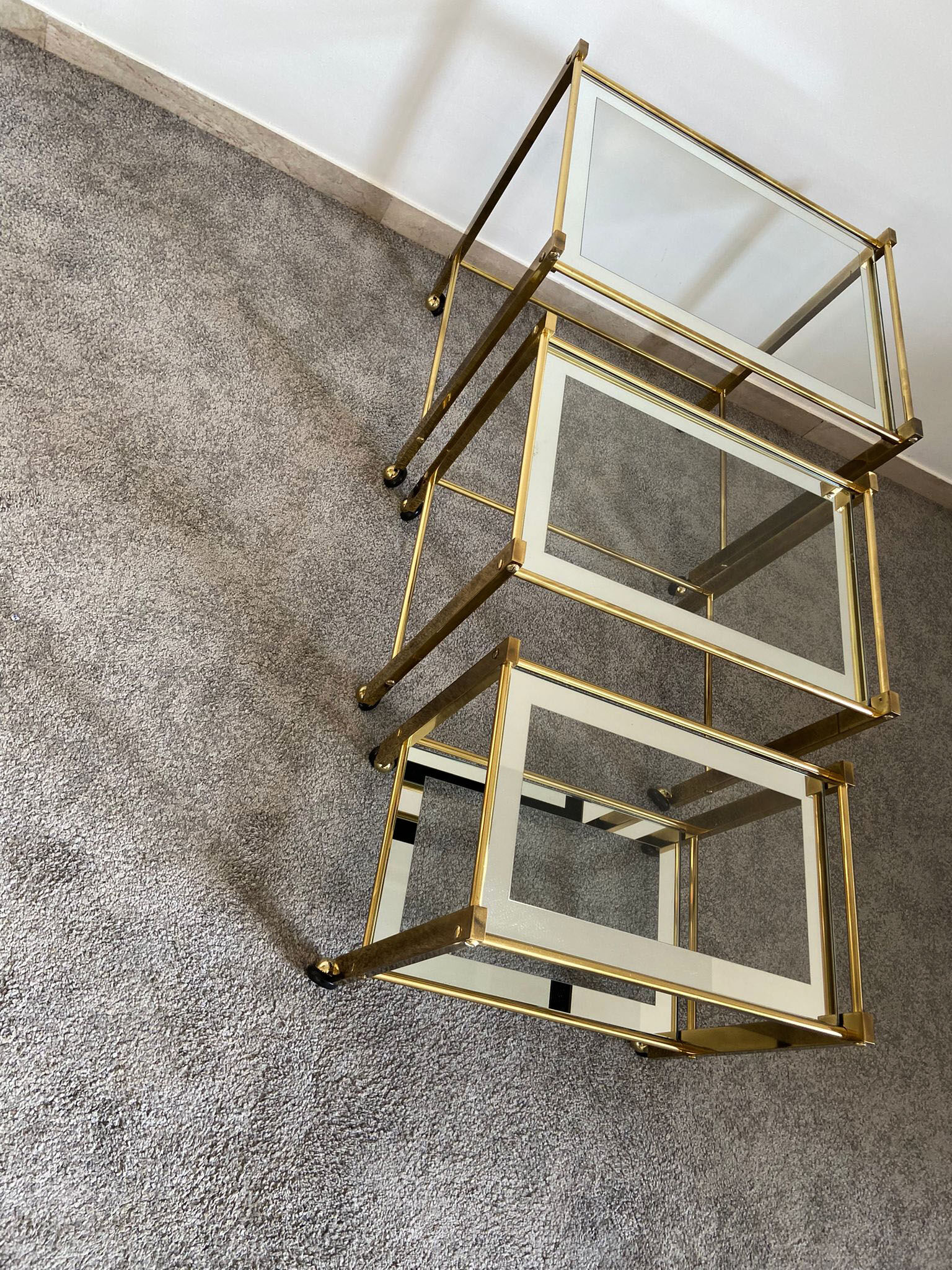 Trio of coffee tables "Nido" brass and glass Italy 70s