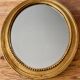 Antique gold oval mirror