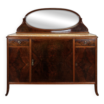 Art Nouveau buffet in walnut burl with marble top and oval mirror.