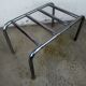 Hotel luggage rack, in chrome steel. The 50's