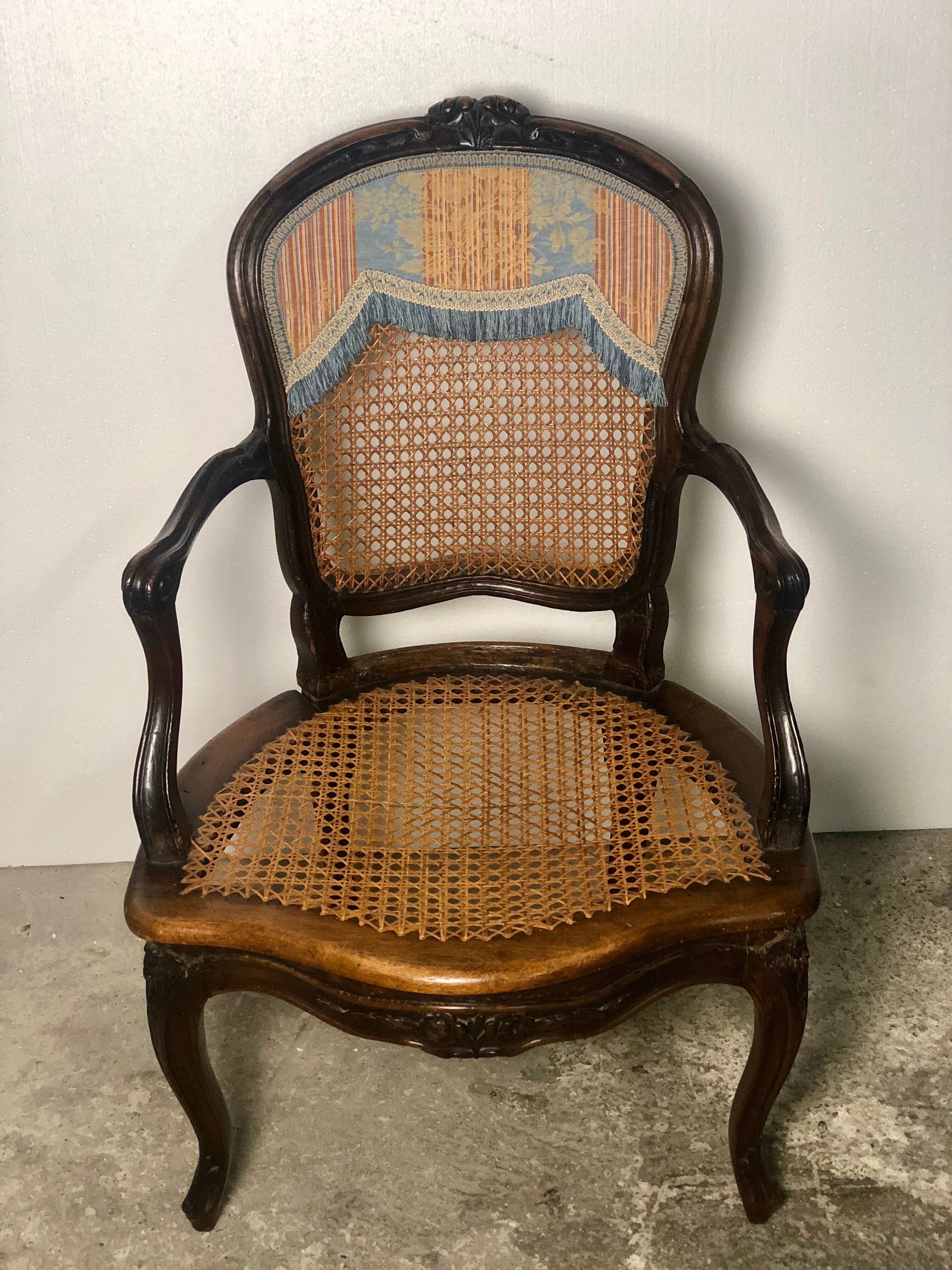 Convertible armchairs Louis XV era in walnut moulded and cannes