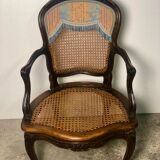 Convertible armchairs Louis XV era in walnut moulded and cannes