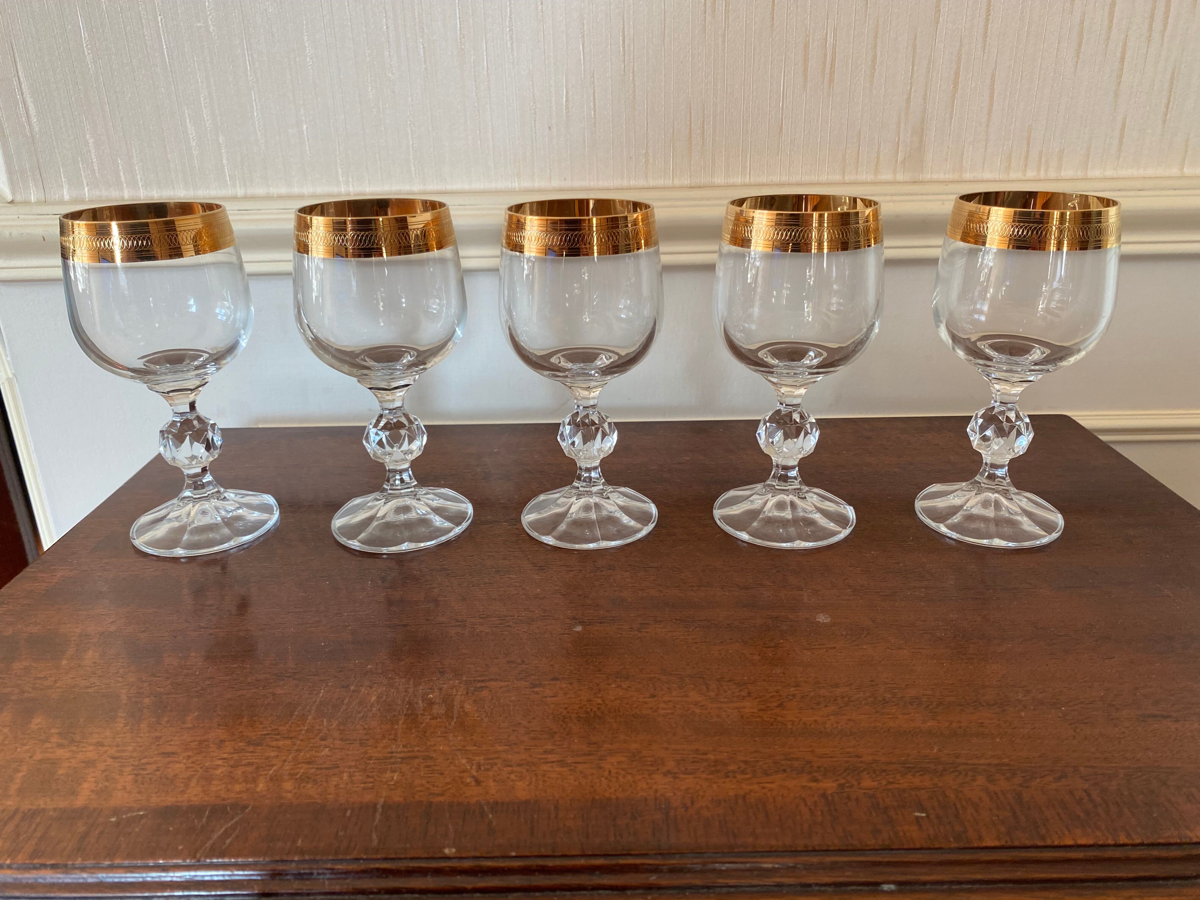 Crystal glasses with gilded edging