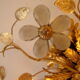 Vintage wall lamp or ceiling lamp in golden metal, glass flowers