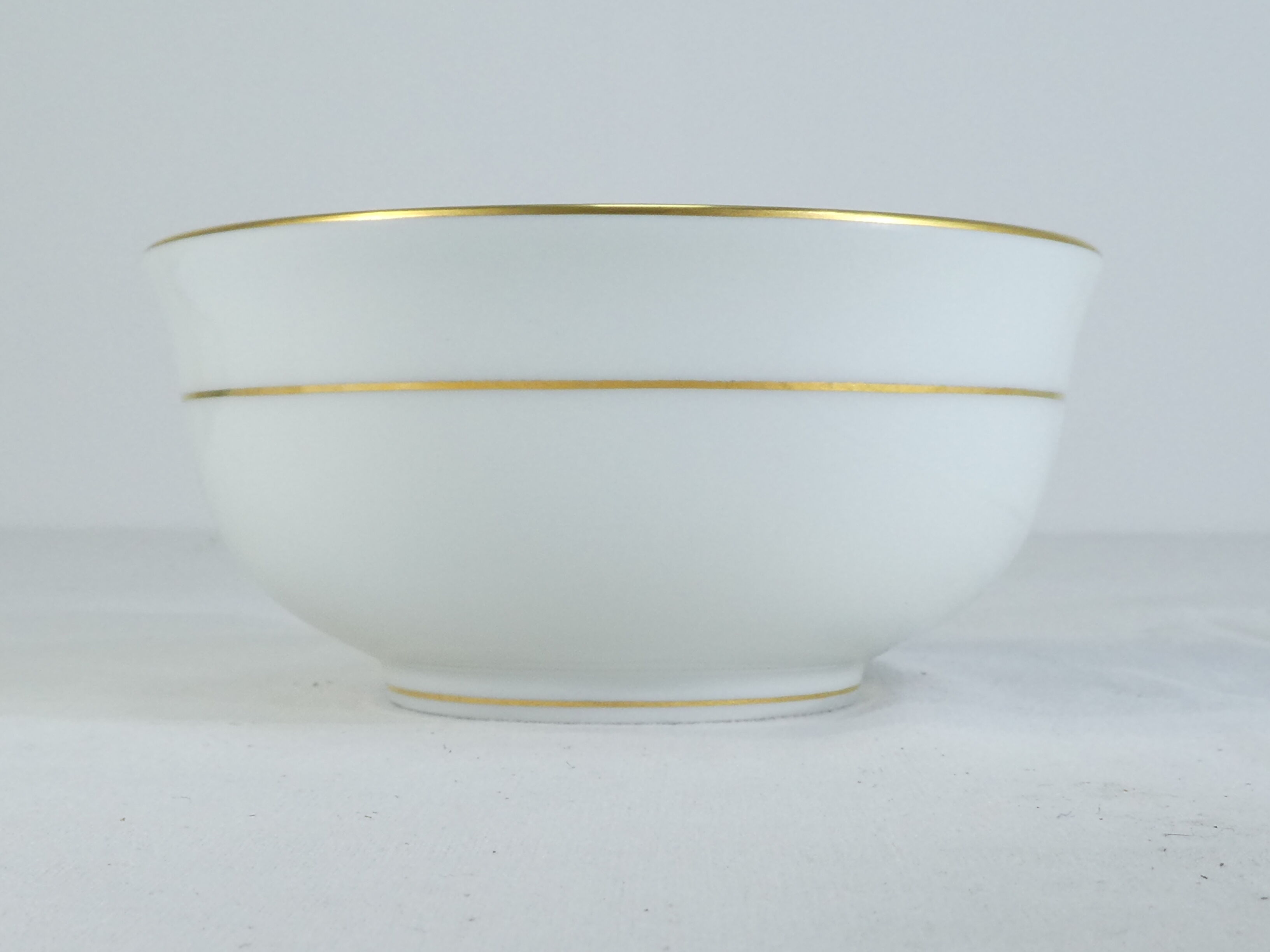 Green and gilded LIMOGES porcelain cup and cup lunch