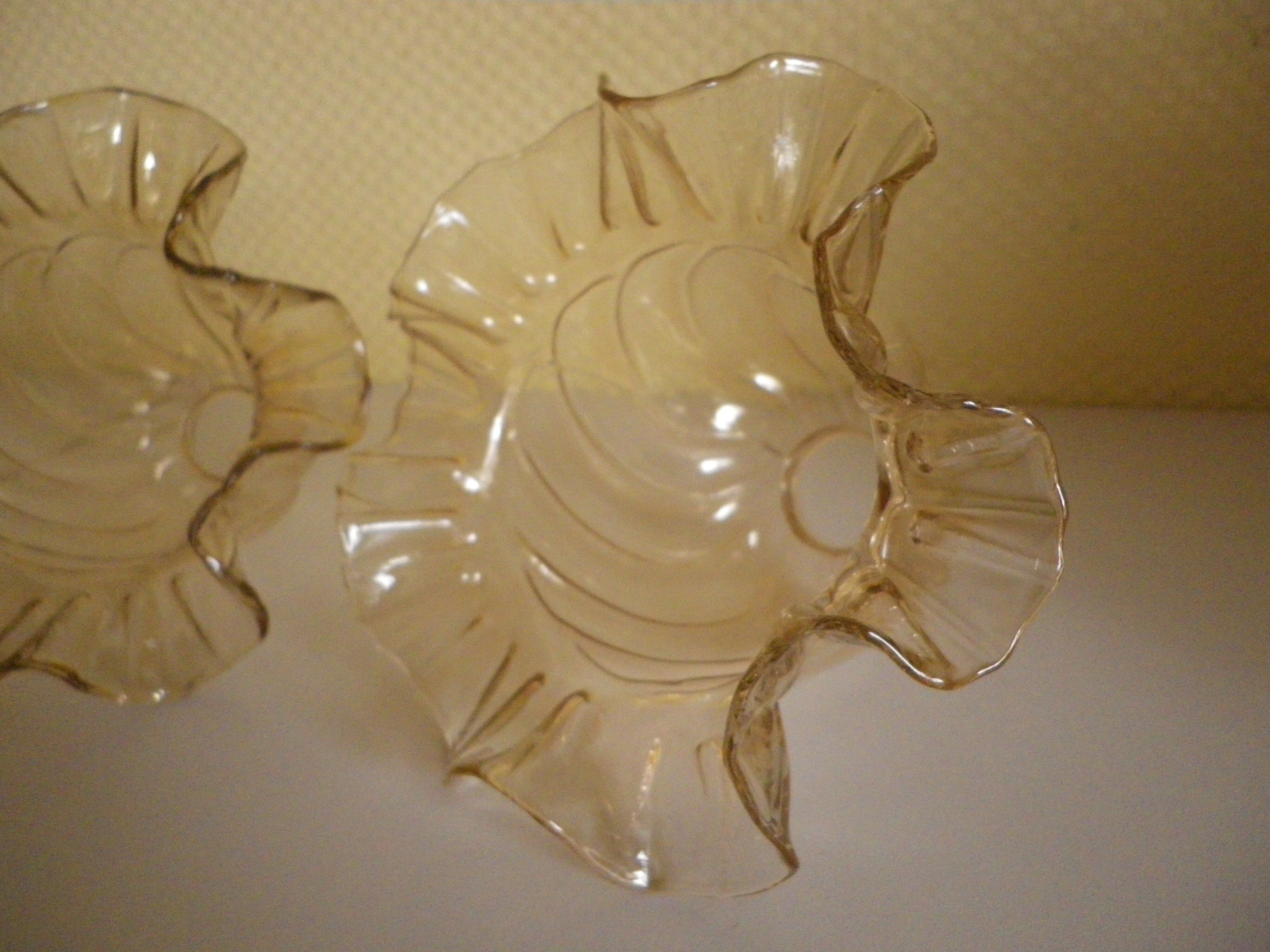 Two corolla-shaped lampshades for suspension or applique, amber colour
