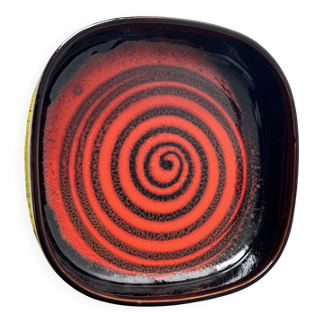 Large decorative ceramic catchall with red and black spiral pattern.