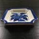 Blue floral decor pocket emptier
