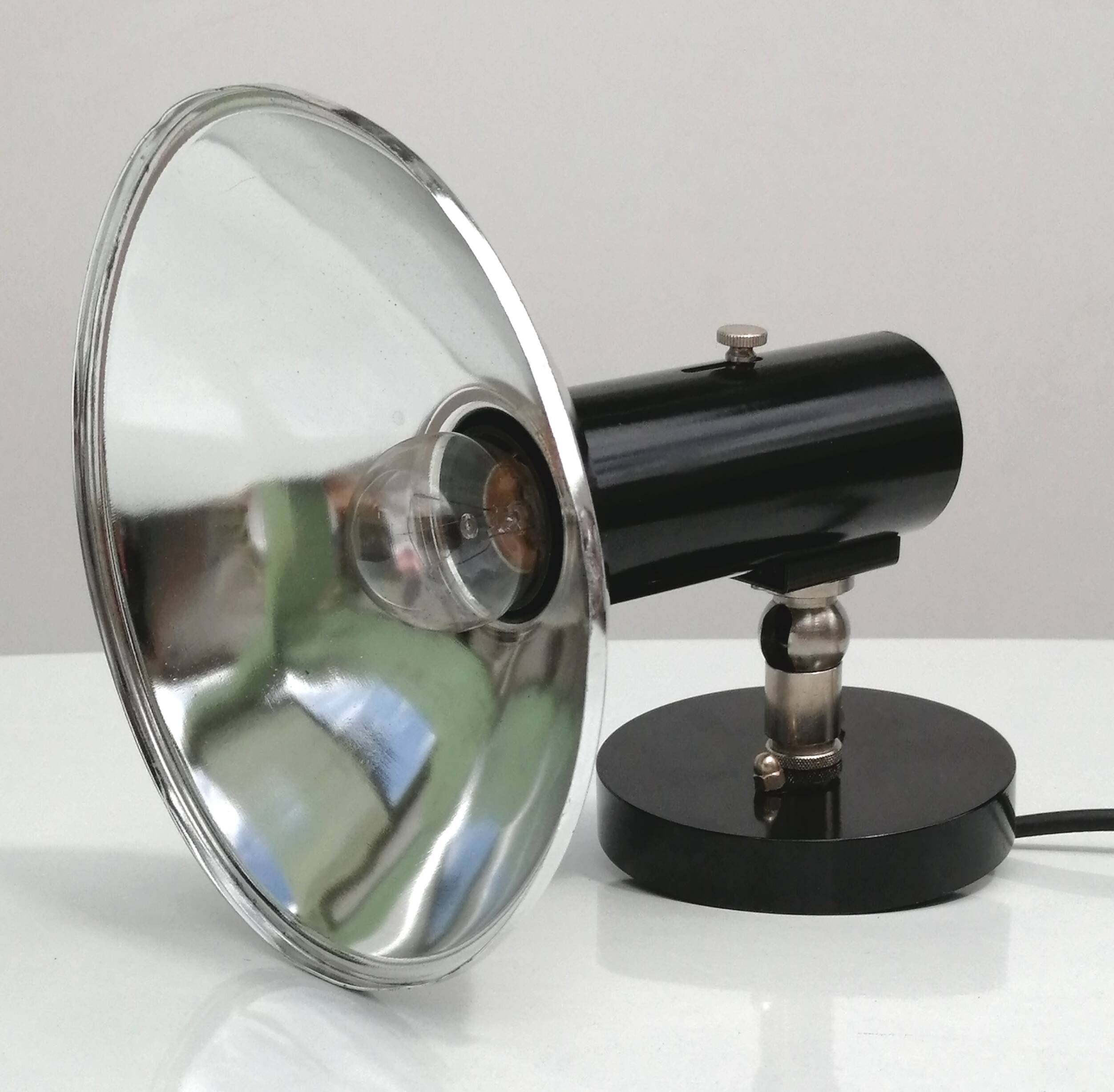 Adjustable black and chrome wall light from Raak, vintage 1960.
