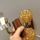 Ensemble d'appliques murales en palissandre, laiton et verre de couleur ambre. danois des années 1960