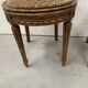 Paire de chaises a médaillons de style Louis XVI en hetre teinté XX siècle