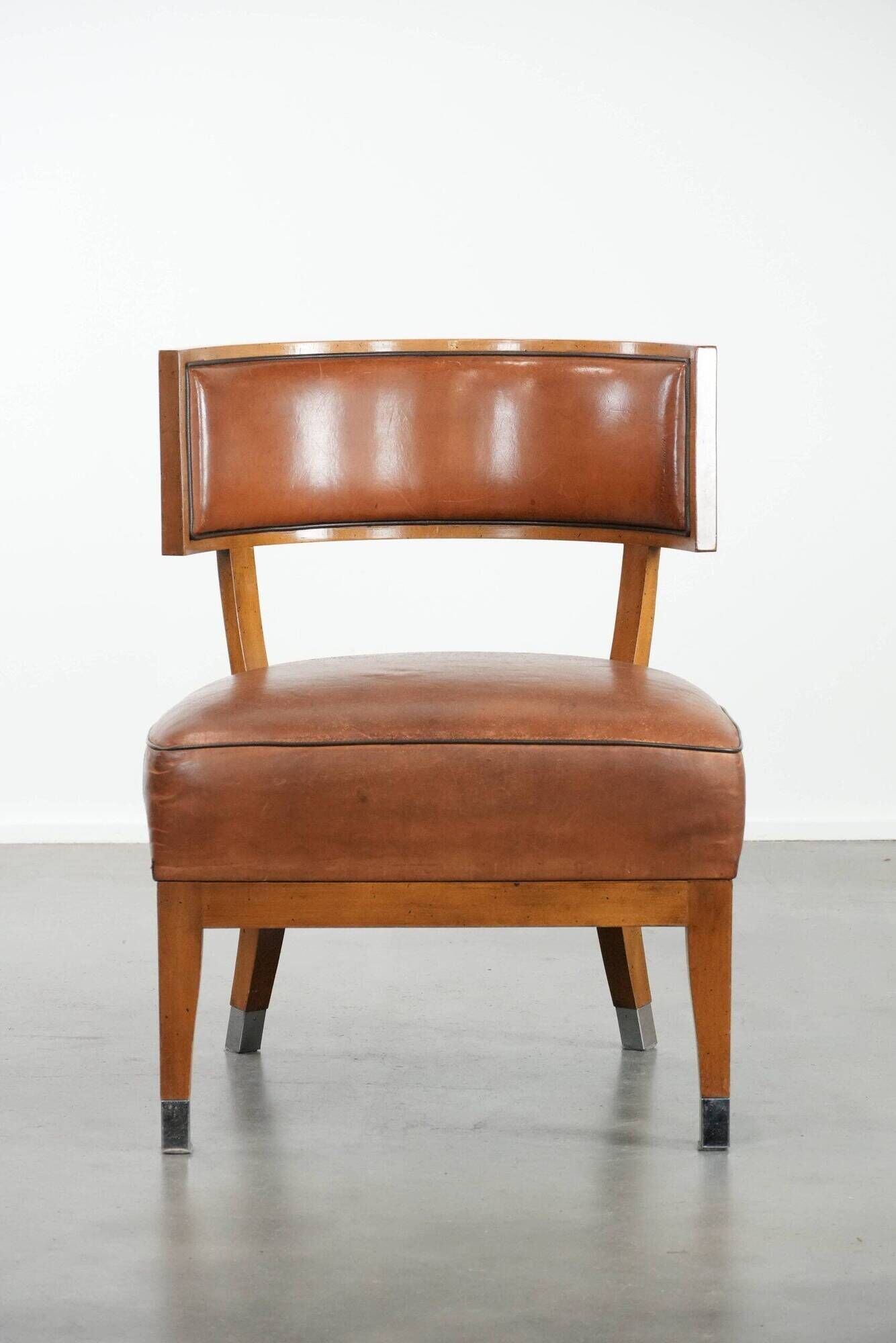 Vintage design armchair / cocktail chair made of sheepskin leather